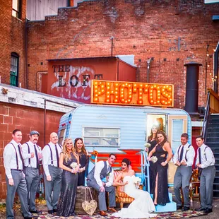 Bridal party outside the Loft with the Camera Camper Photo Booth!