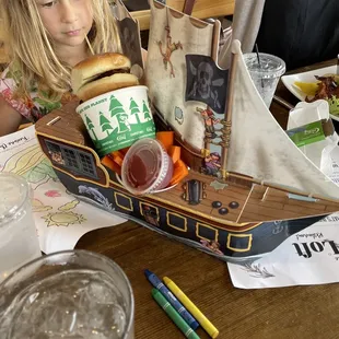 Kids meal in a pirate ship.