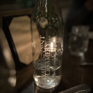a bottle of water and a knife