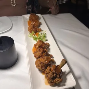 Appetizer: The Loft Chicken Lollipops.
