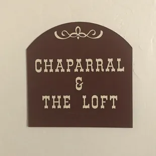 a sign that says chaparial and the loft