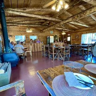 a dining room with a wood stove