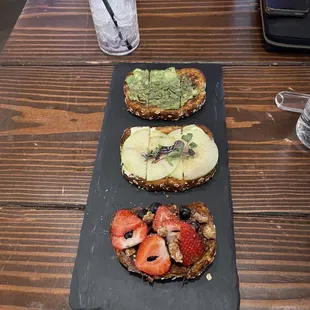 Toasts Brunch (going up to down: avocado, apple, brie, and honey, and Nutella and berries)