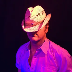 a man wearing a cowboy hat