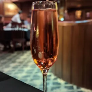 a glass of rose wine