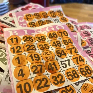 a pile of bingo cards