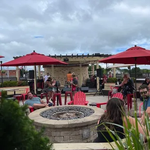 Rooftop fire pit and stage for live music