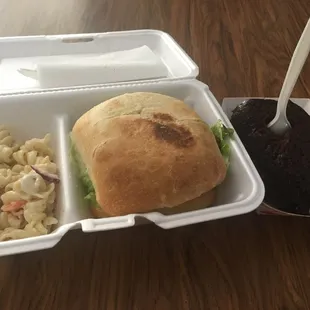 Hawaiian burger and pasta salad with chocolate cake. $13 and came with a drink too.