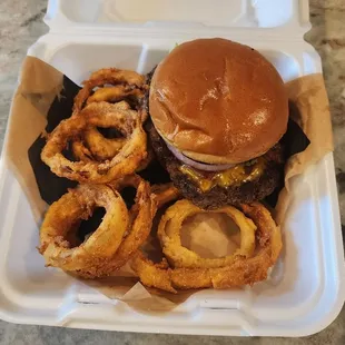 The  1/2 hawk burger with onion rings