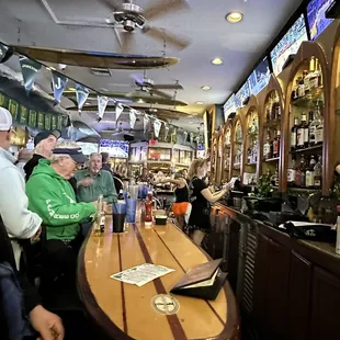 people sitting at the bar