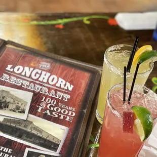 two cocktails on a tray