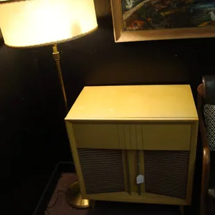 I found a mid century modern vendor in a corner in the basement!