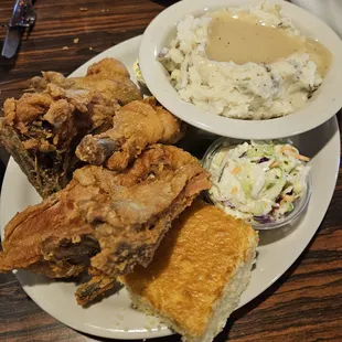Fried chicken, 3-piece, slaw, and mashed potatoes, corn bread.