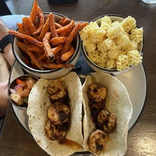 Shrimp tacos (they have an onion jam under them) and Mac n cheese with sweet potato fries