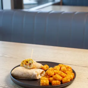 a burrito and tater tots