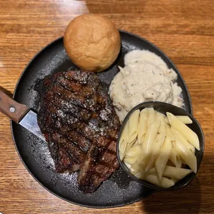 Ribeye, mashed potatoes, Mac and cheese