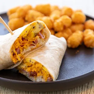 a breakfast burrito and tater tots