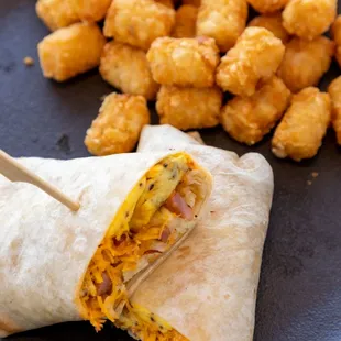a burrito and tater tots