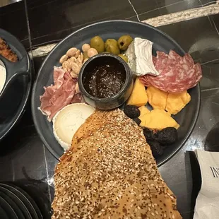 BUTCHER'S BOARD- assorted cheese and charcuterie, citrus-marinated olives, lavosh crackers