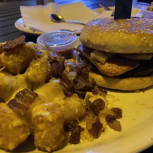 Spam burger and loaded tots.