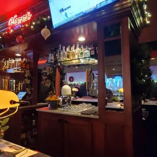 a bar with a television in the background