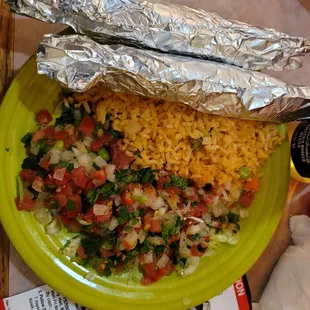 a plate of food with rice and vegetables