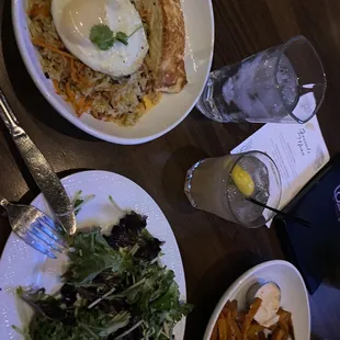 Seasonal pear salad and gin cocktail. Sweet potato fries (not pictured is burger with regular fries). Salmon bowl.