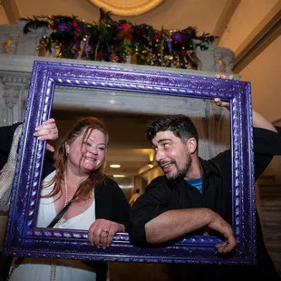 Bride and groom shot at entrance at the end of the night