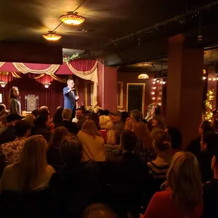 a man speaking to a crowd