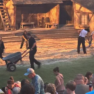 Staff preparing stage setup