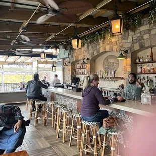The seating &amp; bar of the terrace area. Also the scallops dish that I really enjoy when I visit the restaurant.