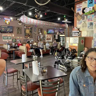 a woman sitting at a table