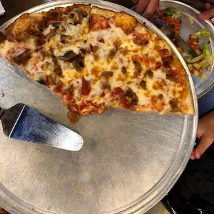 Sausage and mushroom on thick crust.