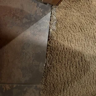 exposed nails from carpet