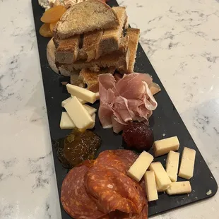 a platter of meats and cheeses
