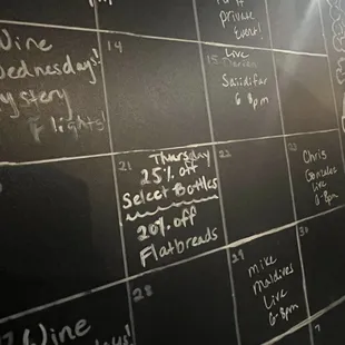 a blackboard with a calendar on it