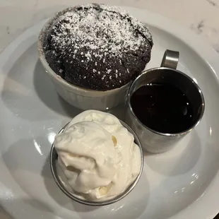 a chocolate cake and a cup of coffee