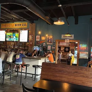 Interior view from dining room into bar and arcade areas