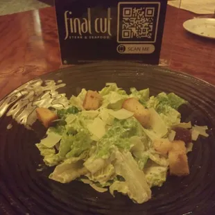 Tiny Caesar with soft soggy croutons.