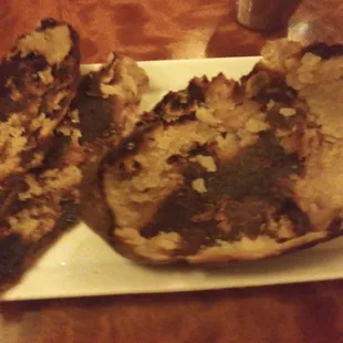 Interior scorched baked potato skin.