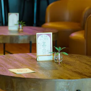Table with comfy chairs in the Lounge at Valeria