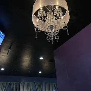 a chandelier hanging from the ceiling