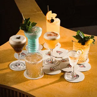 a variety of cocktails on a table