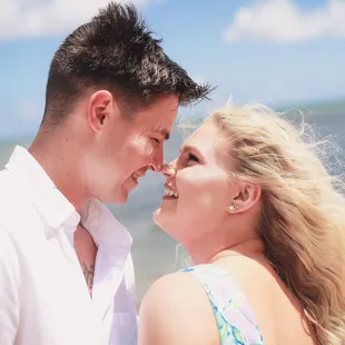 Fun and lively engagement session on the beach in Hawaii