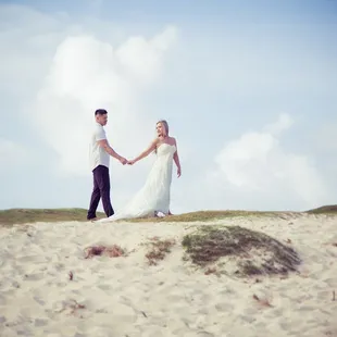 Bride and groom on the beach in Hawaii