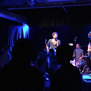 a band performing on stage