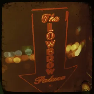 a neon sign for the lowbrow palace
