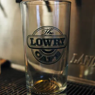 a pint glass on the counter