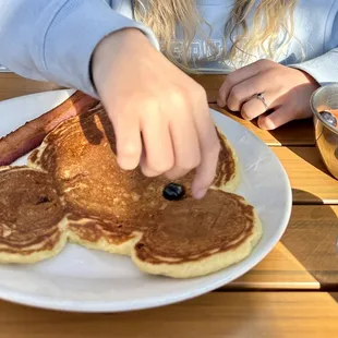 Kids menu Mickey Mouse pancake with bacon