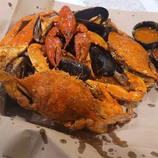 Blue crab, snow crab, mussels, crawfish, Crack sauce, spicy sauce, fortune cookie.